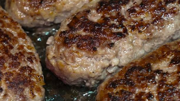 istock Preparing and serving lula kebab cutlets on bamboo skewers 1857044976