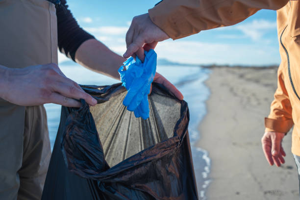 istock Together we can make a difference.Let's clean up our planet from the plastic pollution. 1857056121