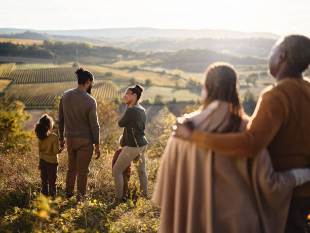istock Happy black family talking while spending autumn day with grandparents. 1857067491