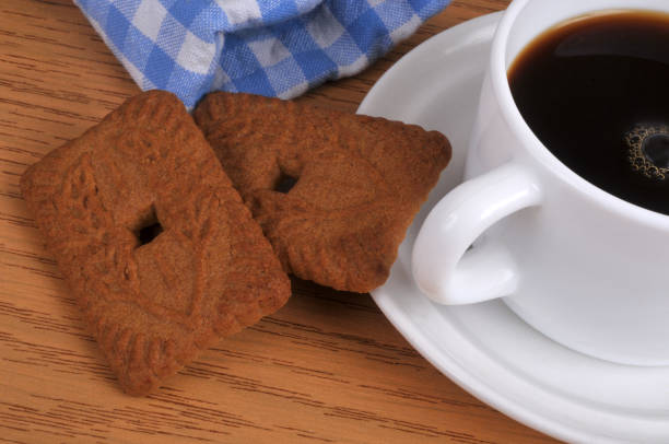 Speculoos and coffee Speculoos with a cup of coffee close-up tasse café stock pictures, royalty-free photos & images