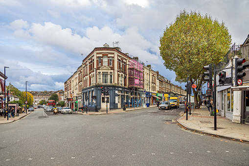 Dartmouth Park Hill, Highgate, London, England - October 31th 2023:  Old residential building on a street corner in a suburb to London