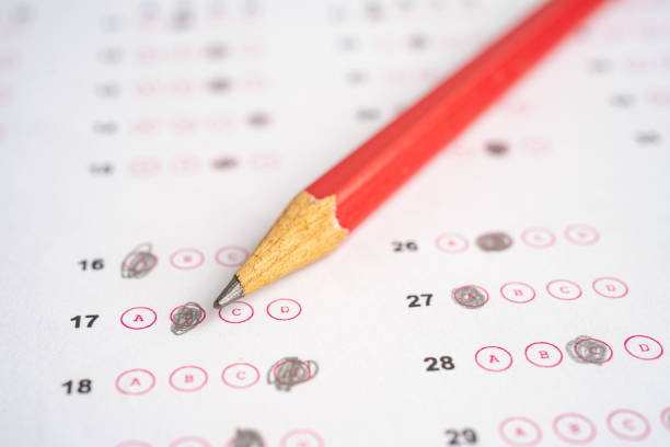 istock Answer sheets with pencil drawing fill to select choice, education concept. 1857098463