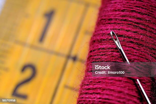 Red Spool On Measuring Tape Stock Photo - Download Image Now - Centimeter, Clothing, Color Image