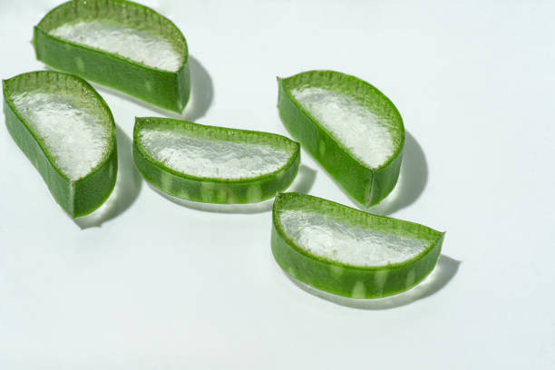 istock Aloe slices on white background, macro shooting presentation texture 1857113611