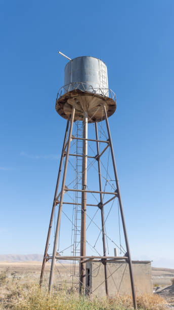 istock Blue tower with sky background. Water tank with blue sky 1857114695