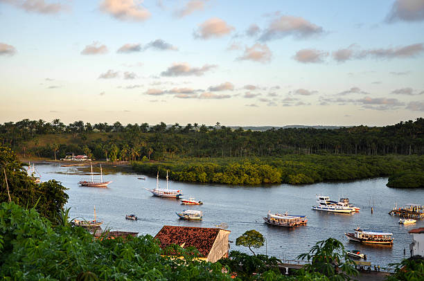 Brazil, Bahia, Camamu. Boats in the bay stock photo