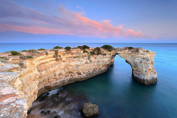 istock Stone arch on the Algarve coast 185713519