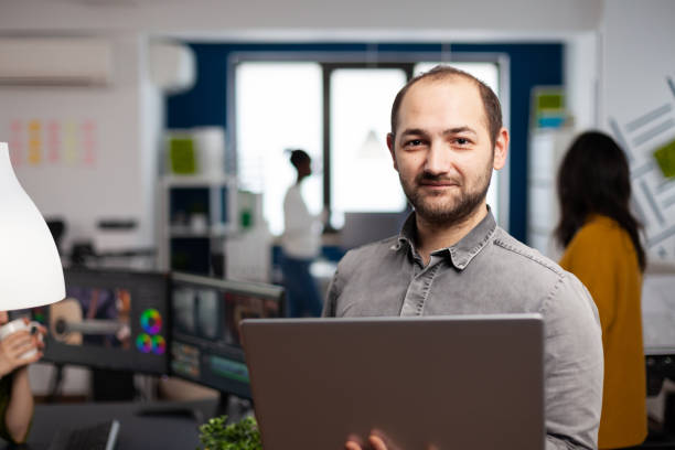 istock Video editor worker standing in front of camera smiling 1857177167