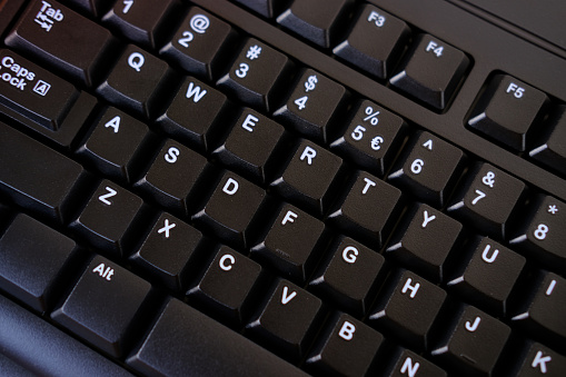 close-up black keyboard, office environment, computer peripherals, computer technologies and the IT industry, online learning, digital work routine, blogging and social media