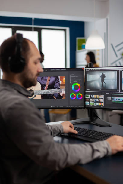 istock Graphic video production working on pc with two displays editing video 1857204532