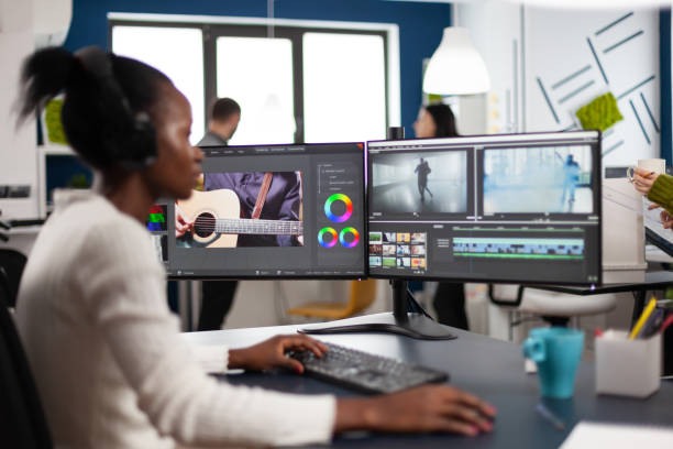 istock Black woman videographer developing project film montage 1857217818