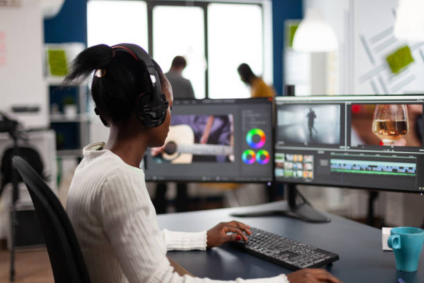 istock Black woman editor working at project film montage 1857218897