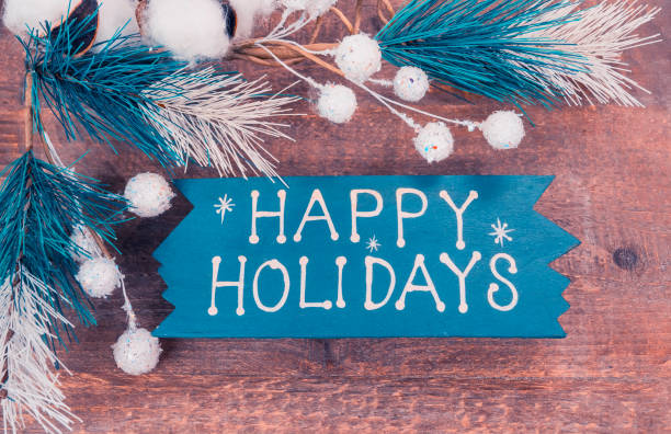 istock wooden blocks and text happy holidays 1857220452