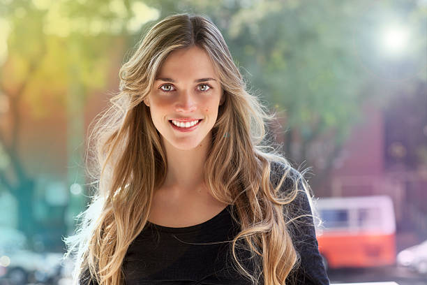 istock blonde girl smiling 185723692