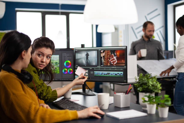 istock Team of editors women working with modern studio post production software 1857238279