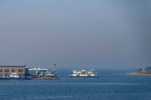 Airport over Lake Ontario from Toronto , Ontario, Canada on a bright Autumn day with a cloudless sky.  This is the ferry port for the airport.