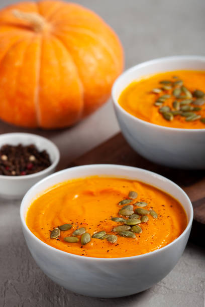 istock Pumpkin soup with seeds and spices close up 1857244673