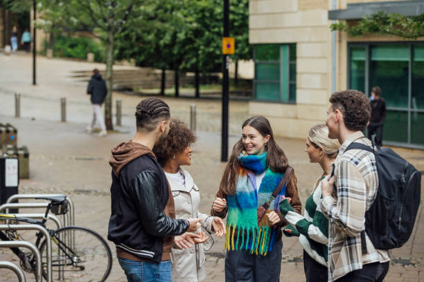 istock Students Converse in the City 1857245189
