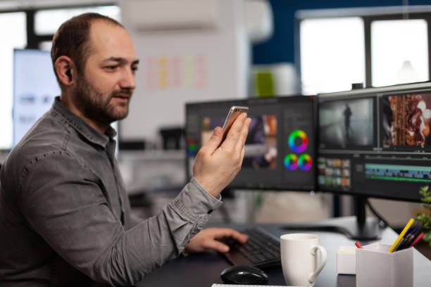 istock Multimedia creator artist talking on videocall with client 1857245744