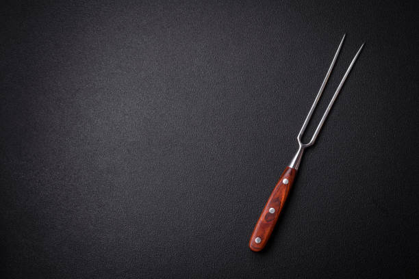 istock Kitchen knife and fork made of steel with copy space 1857251118