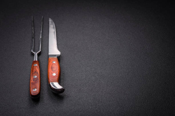 istock Kitchen knife and fork made of steel with copy space 1857252750