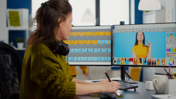 istock Freelancer retoucher woman working on computer with photo editing software 1857254355