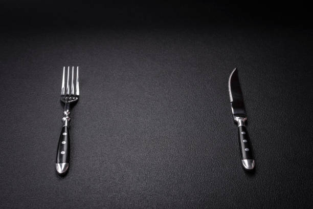 istock Kitchen knife and fork made of steel with copy space 1857257730