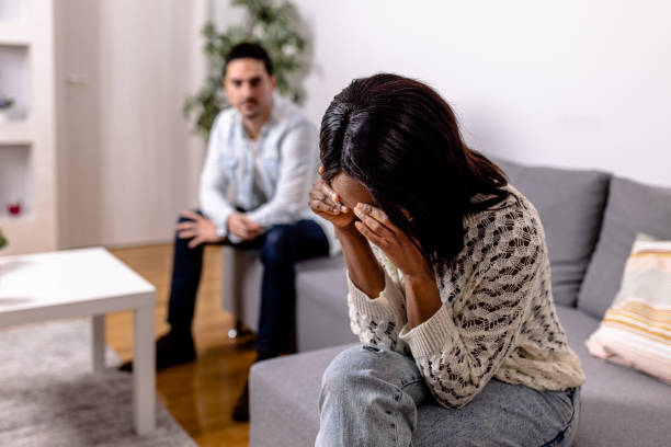 istock Mixed-race couple arguing in modern living room 1857266888