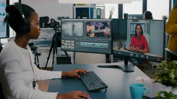 istock African woman editor with headset talking during online conference 1857272923