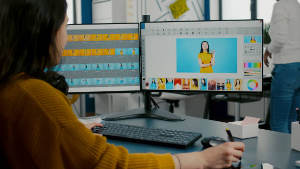 istock Woman designer, photo editor specialist working at pc 1857277675