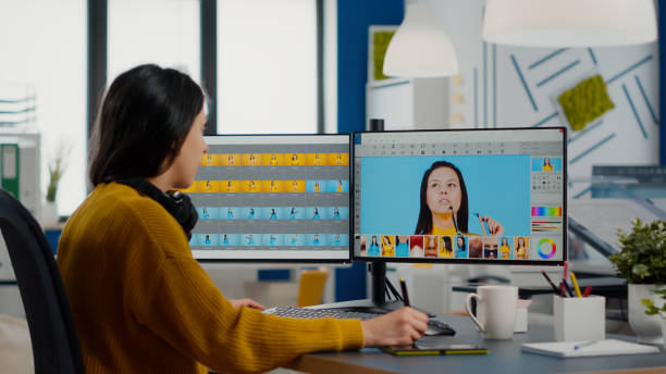 istock Photo editor working on computer retouching photo 1857292615