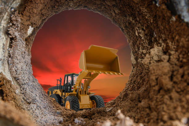 istock Wheel loader are digging the soil in the tunnel 1857295837