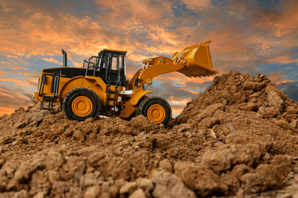 istock Wheel loader are digging the soil in the construction site 1857295838