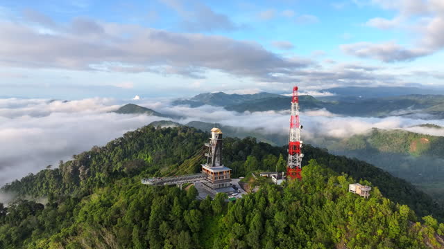 Aerial Drone View of Sea of fog in the morning, Longest skywalk in Asia, Aiyerweng, Betong city, Yala Province, Thailand