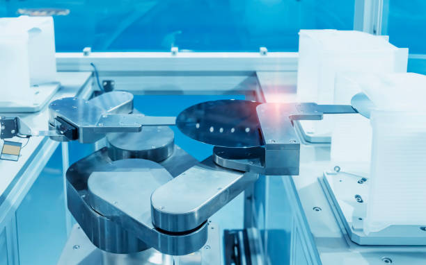 istock automate robot arm with silicon wafers and microcircuits and Automation system control application in smart factory 1857302867