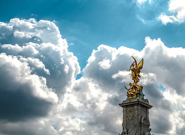Buckingham Palace and statue in the morning in London.