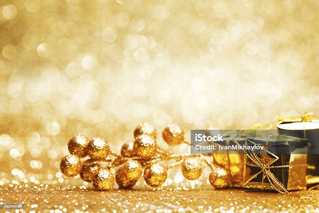 Christmas decoration Colorful christmas decoration on shiny golden background Backgrounds Stock Photo
