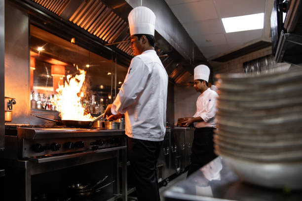 istock Professional chefs in a commercial kitchen of a fine dining restaurant 1857431530