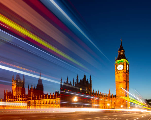 istock Big Ben Clock Tower with Blurred Traffic Light Trials, London, UK 1857431534