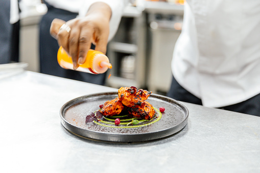 Professional chef cooking indian food in a restaurant