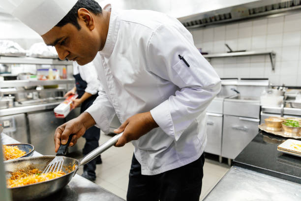 istock Professional chef cooking indian food 1857433630