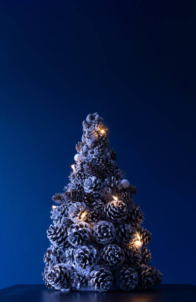 istock Modern Christmas tree made of pine cones 1857444189