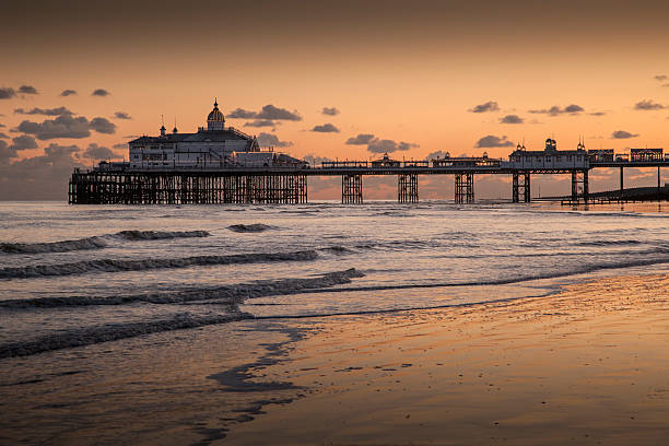 Pier Sunset2 Pier Sunset, dramatic sky, silhouettes eastbourne pier photos stock pictures, royalty-free photos & images