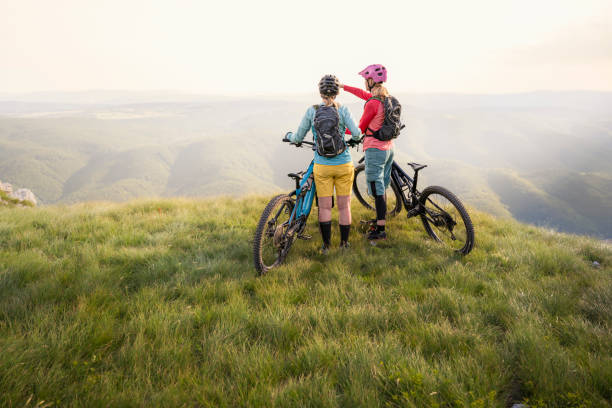 istock Mature women standing mountain top 1857456967