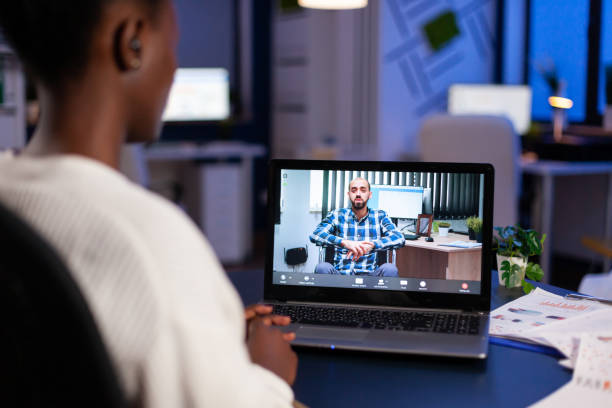 istock Black woman freelancer discussing with paralyzed client on video call 1857467953