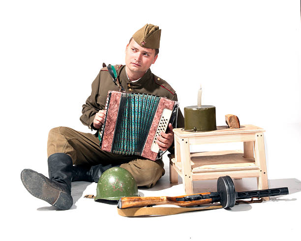 istock soldier with the accordion 185747229