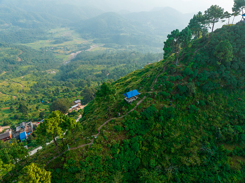 Aerial view of the hill of Thani mai temple, close to Bandipur, Nepal. Details of the stepped path leading to the top of the hill