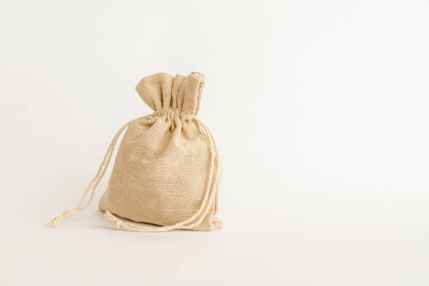 istock Christmas linen Santa Claus bag on white background.Copy space. 1857477120
