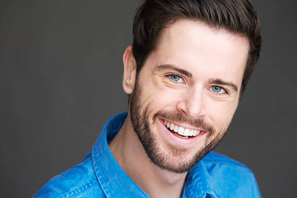 istock Portrait of a friendly young man with happy expression 185749345