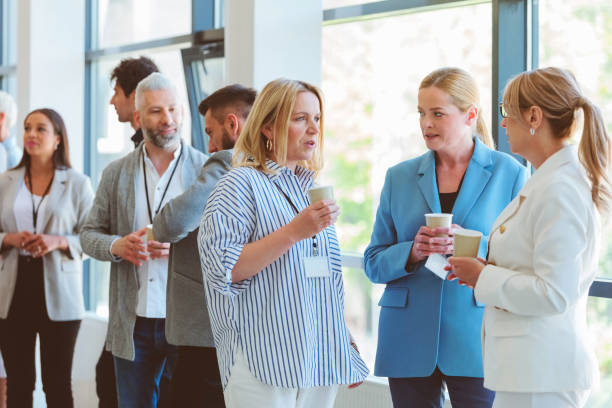 istock Business people in convention center during coffee break 1857503190